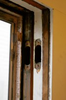 Windows removed, holes where the pulleys went